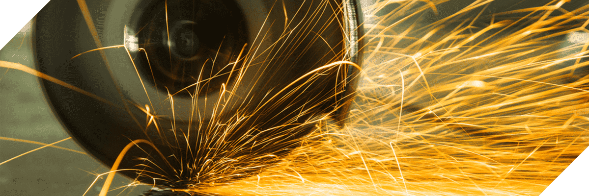 Sparks at Grinding Steel Material — Top End Steel Supplies In Pinelands, NT